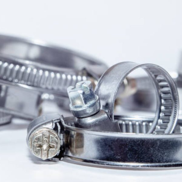 Clamps for tubes with shallow depth of field on a light background